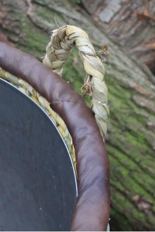 Rush basket with leather trim